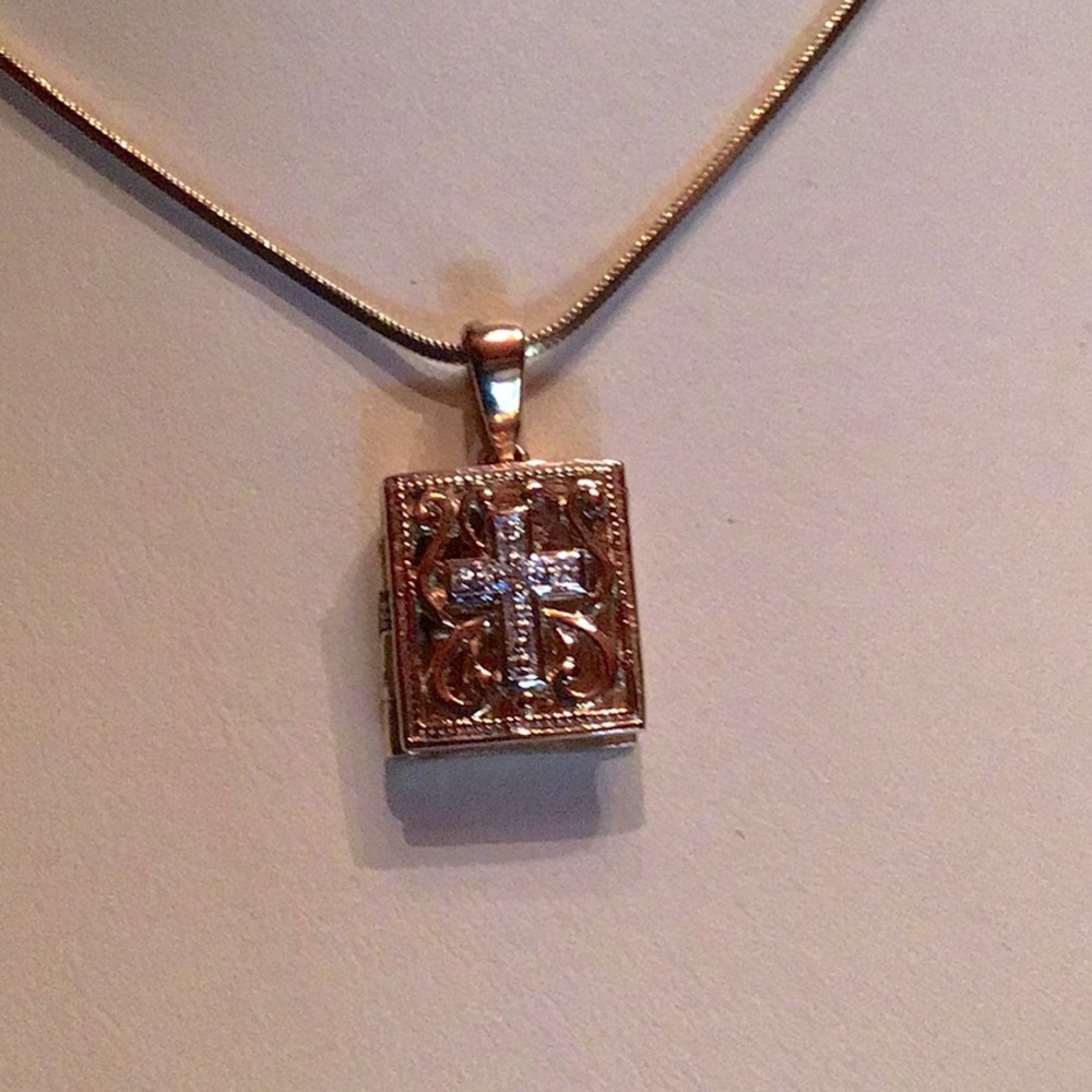 New Fashion Bible Pennant, opens to show gold cross inside. 16” chain